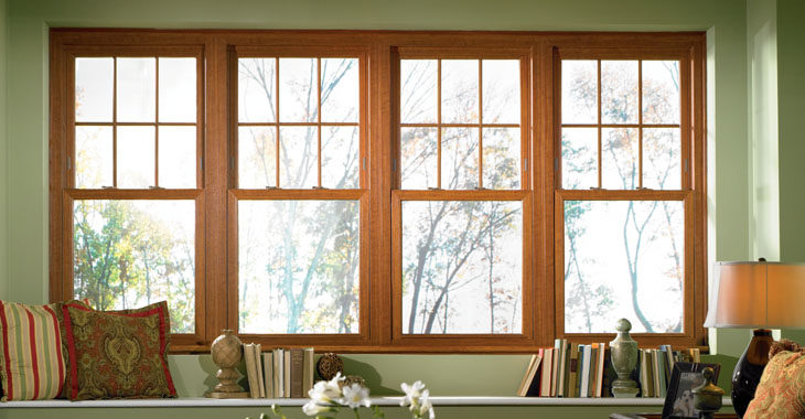Beautiful wood-framed windows in the reading nook of a home