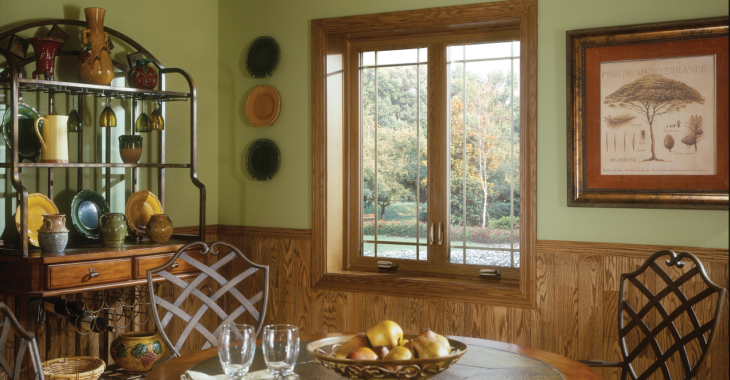 Dining room with beautiful wood-look frame windows