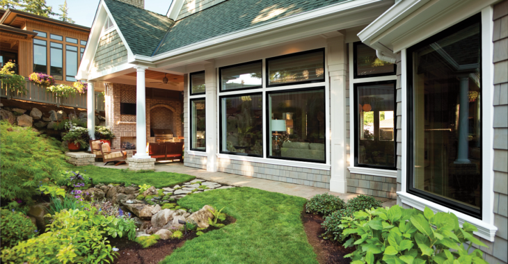 The exterior of a home with a long wall of multiple windows